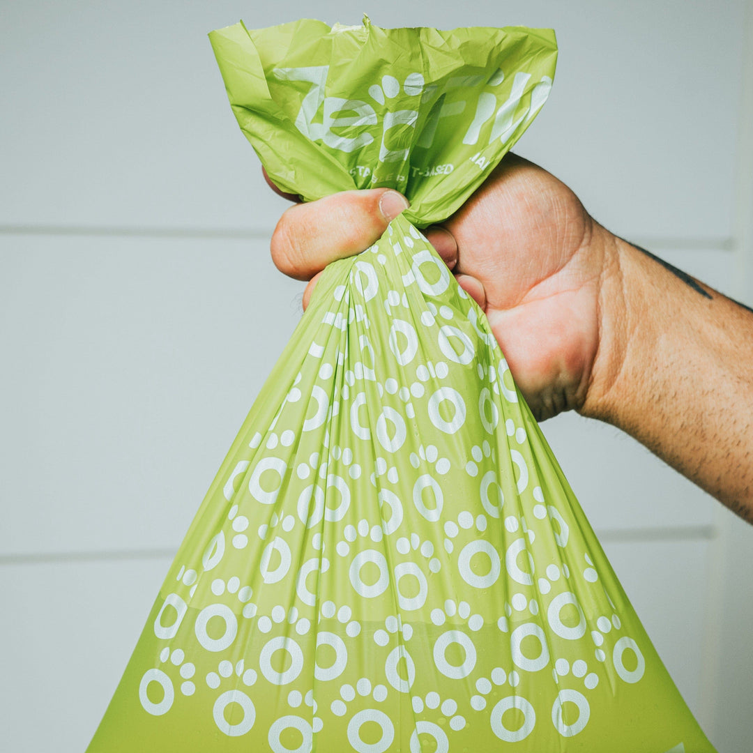 Zeofill dog poop bags filled with water to show strength of bags. 